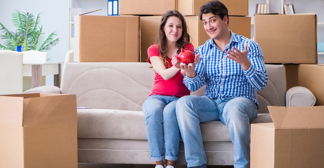 Young couple saving money with self storage.