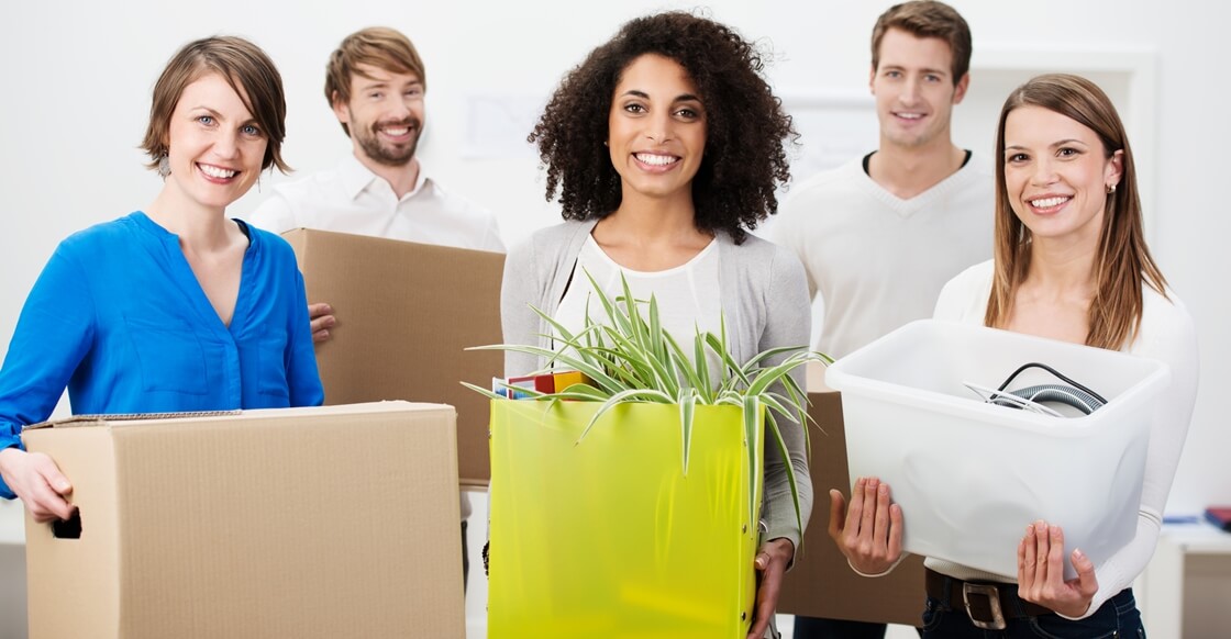 Happy people using self-storage